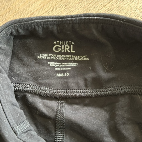 Athleta Girl bike shorts side pocket - Picture 2 of 2